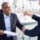 Image of a person buying a boat.