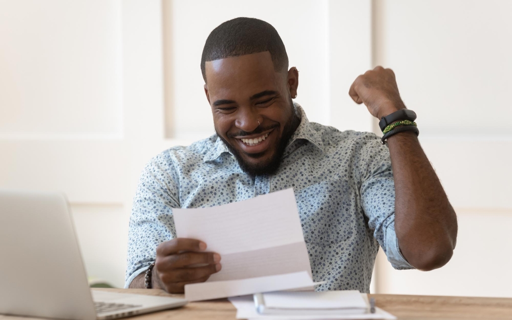 Image of a person excited over their loan approval.
